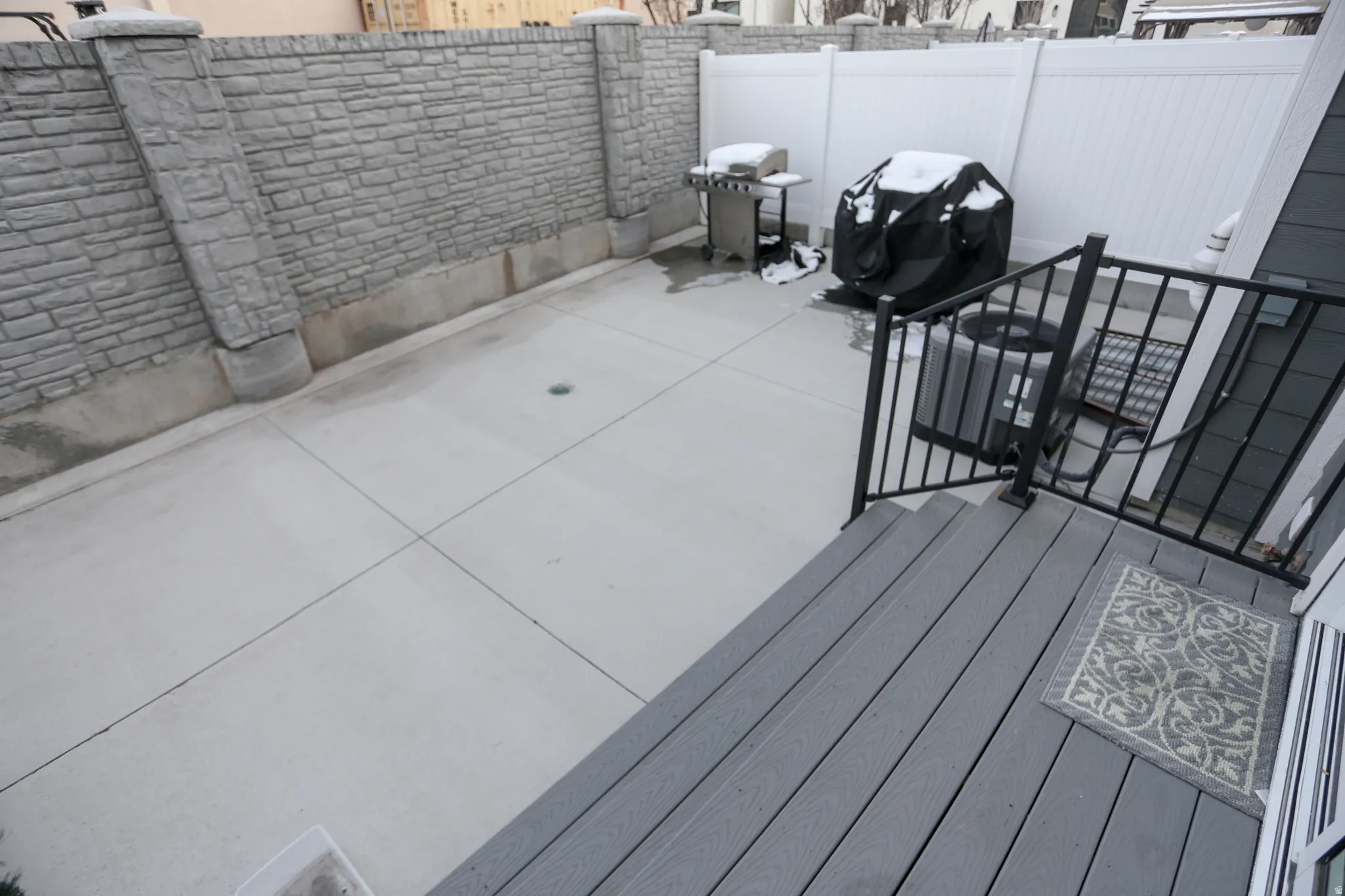 Wooden terrace with a grill