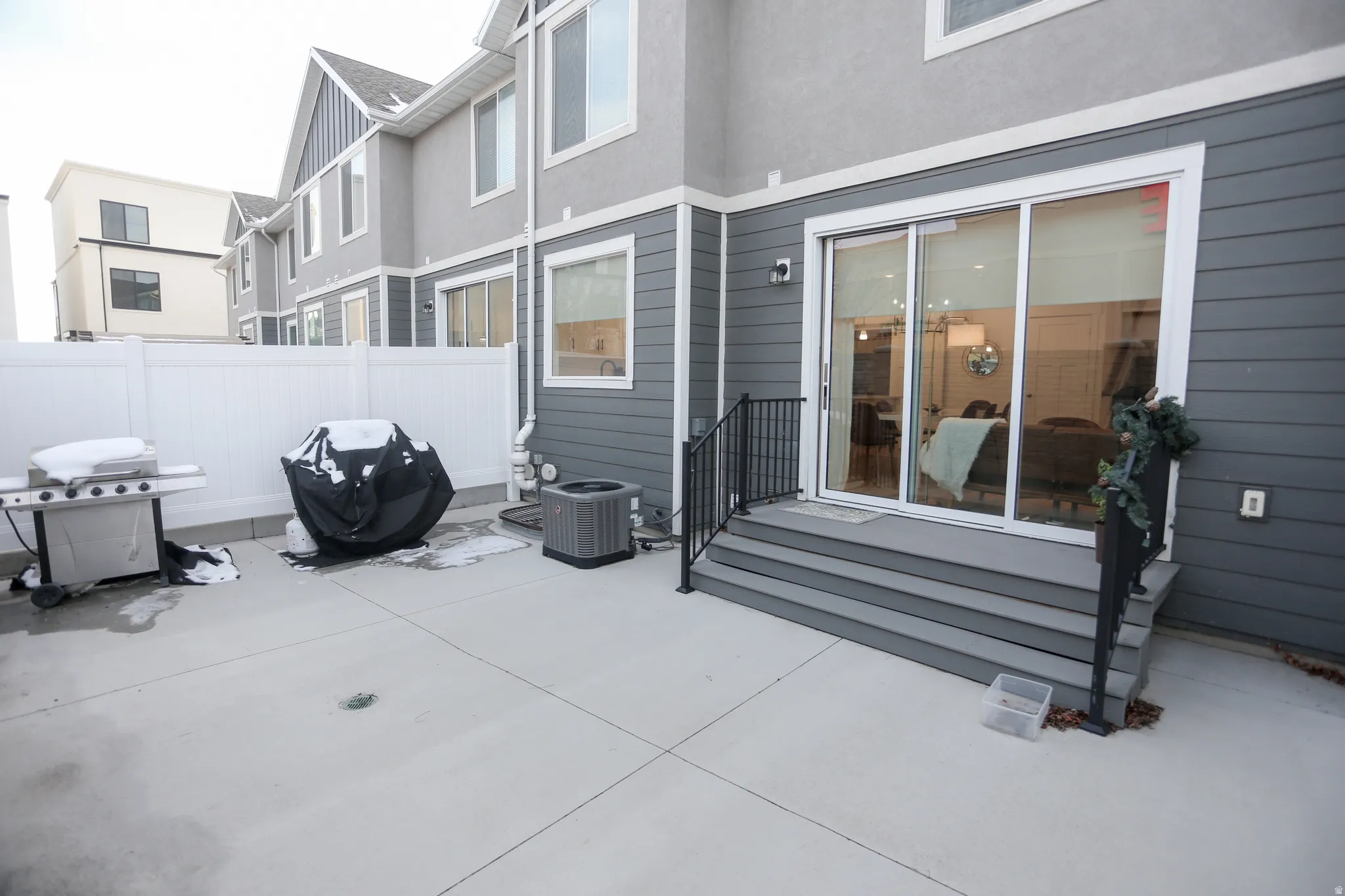 View of patio featuring a grill