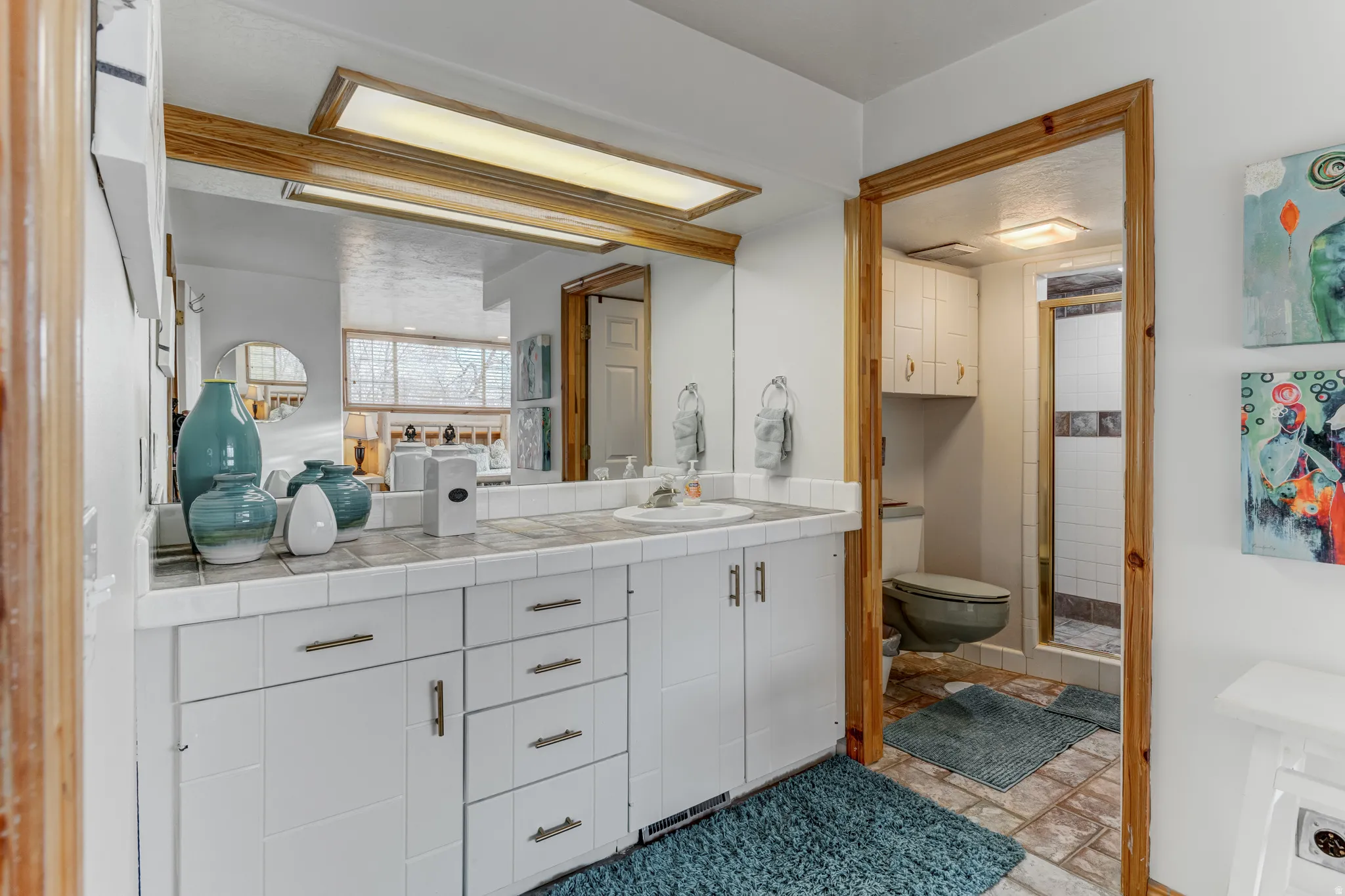 Full bath featuring vanity and a stall shower