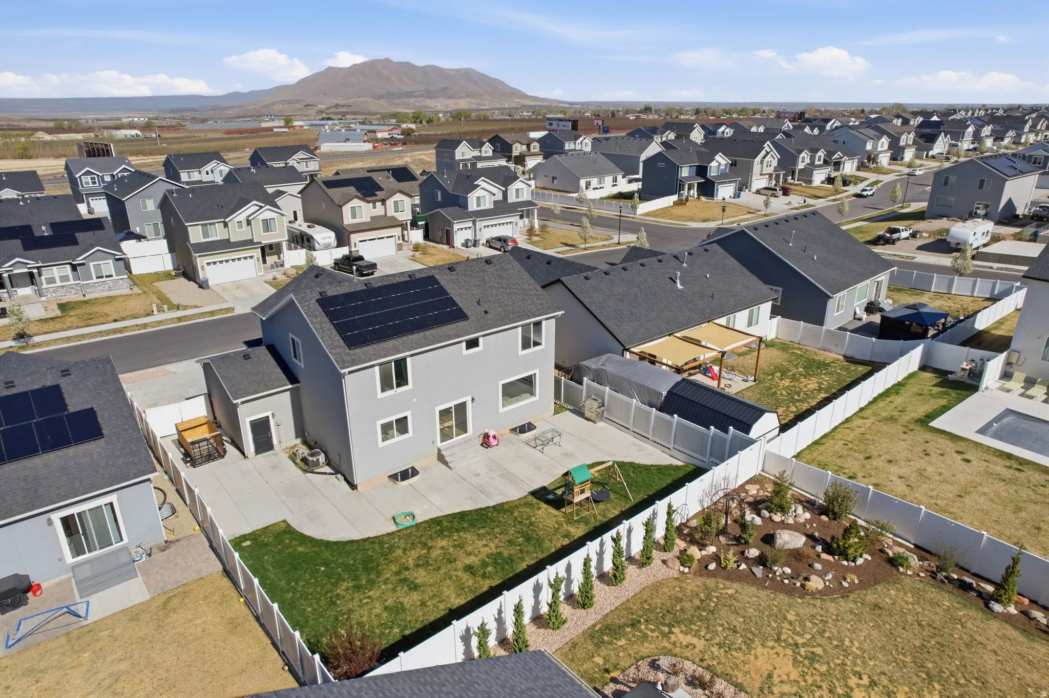 Aerial view of residential area with mountains