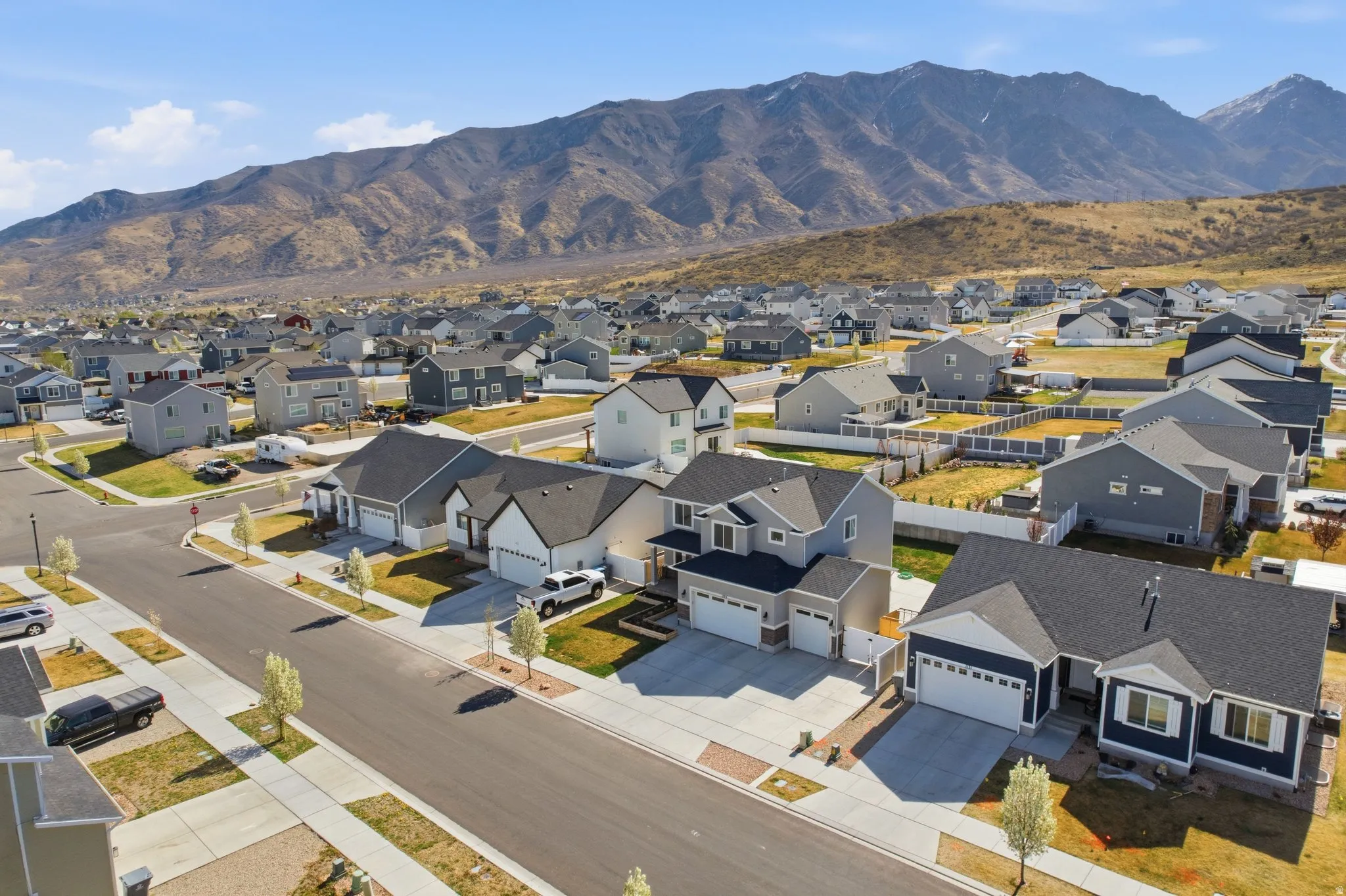 Aerial perspective of suburban area featuring mountains