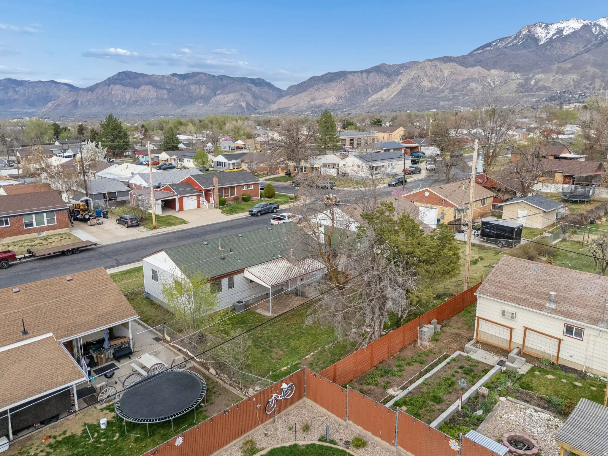 Aerial view of residential area with a mountainous background