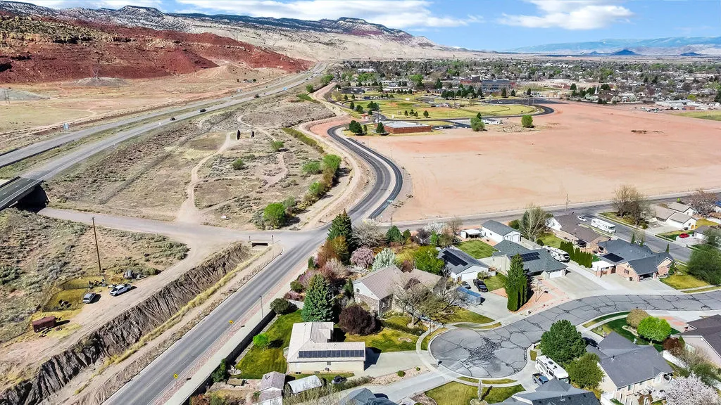 Aerial perspective of suburban area with mountains