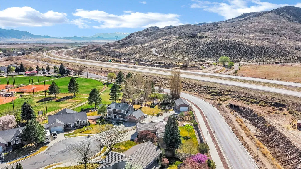 Aerial view of residential area with a mountainous background