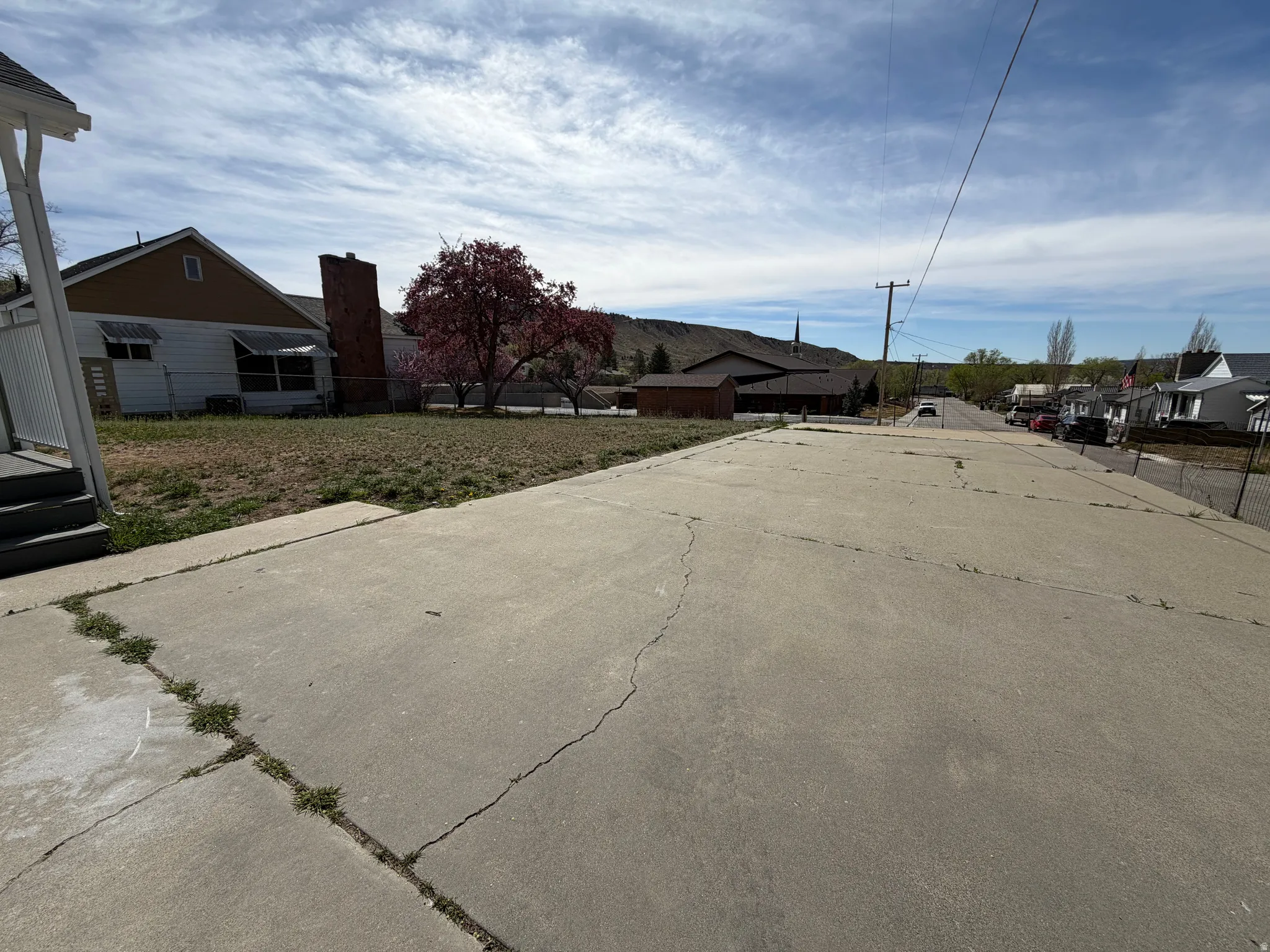 View of concrete road featuring a residential view