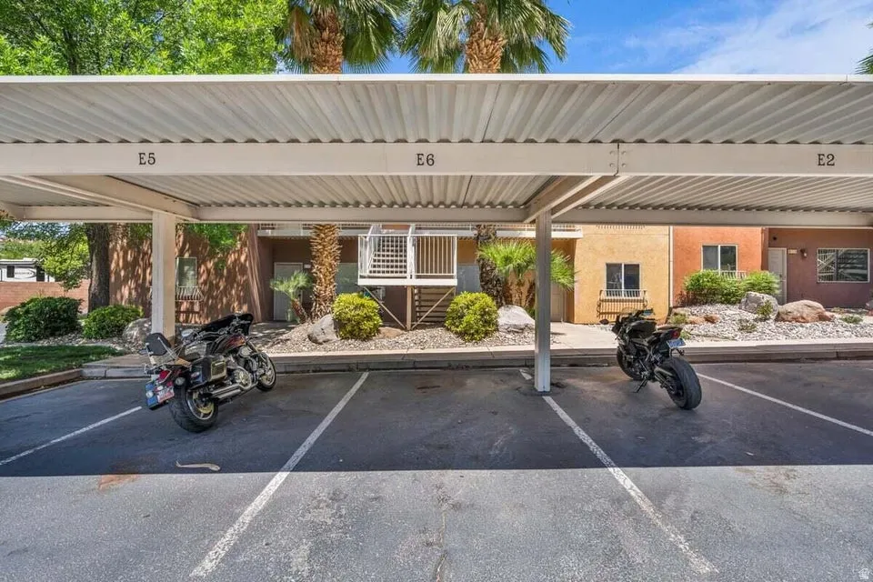 Covered parking structure featuring designated parking spaces