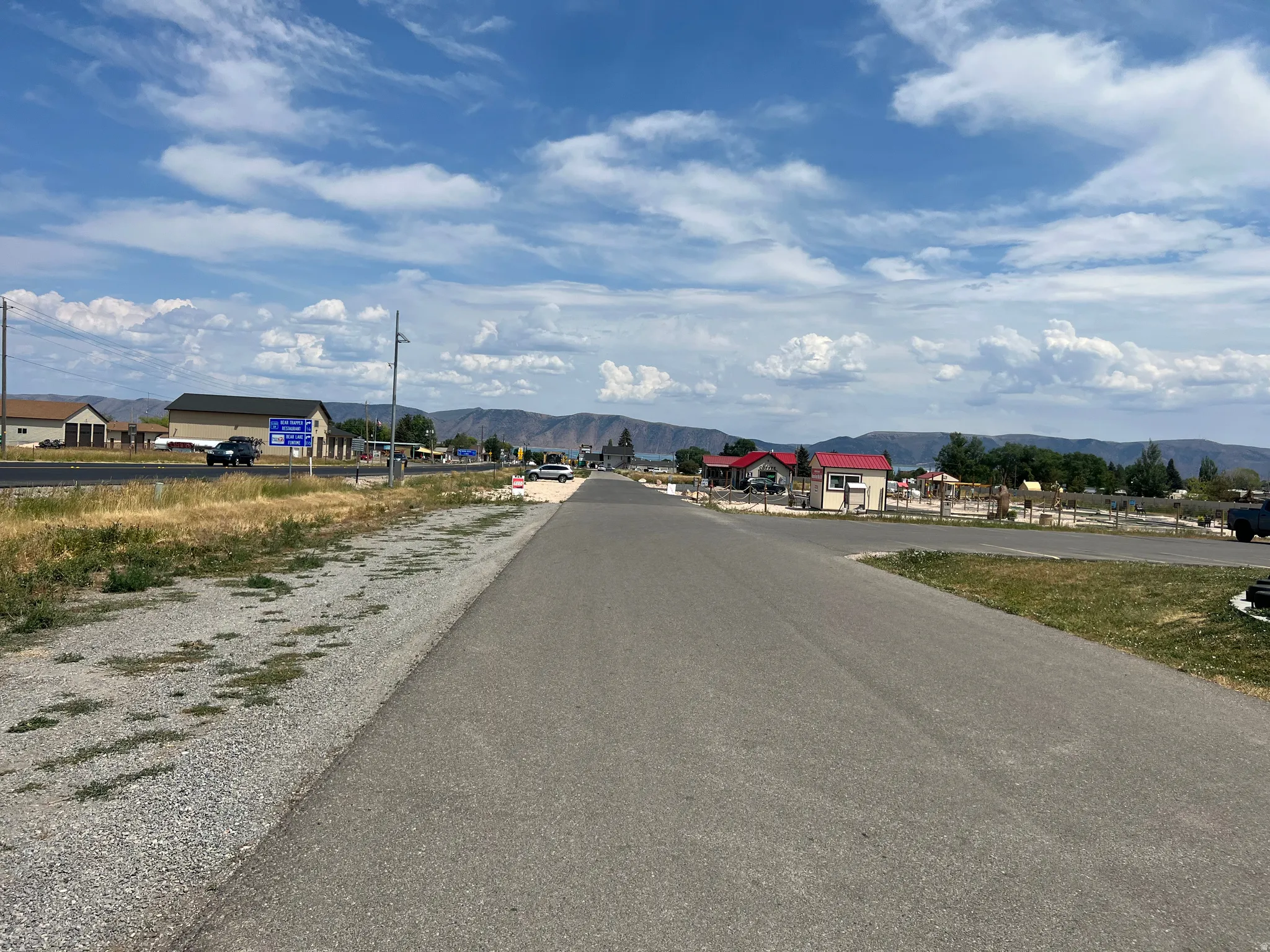 View of asphalt road featuring a mountain view