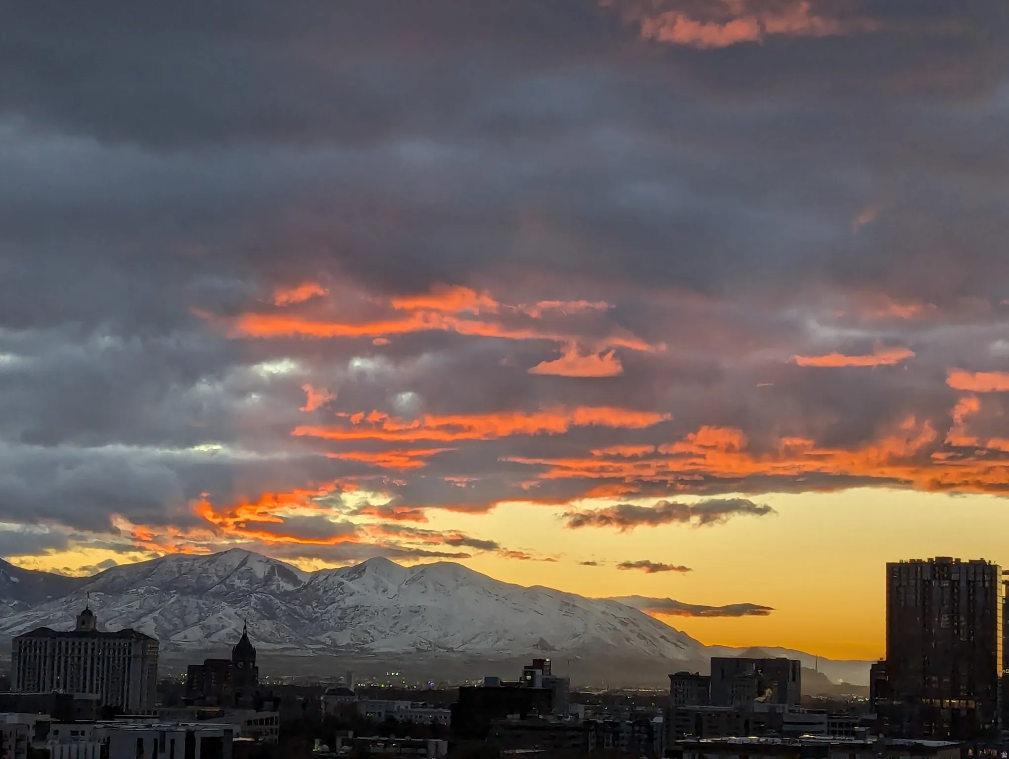 View of mountain background featuring nearby urban area