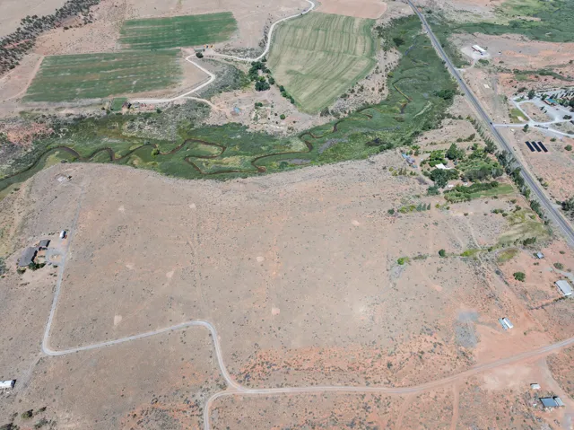 Aerial view of property's location with rural landscape and abundant farmland