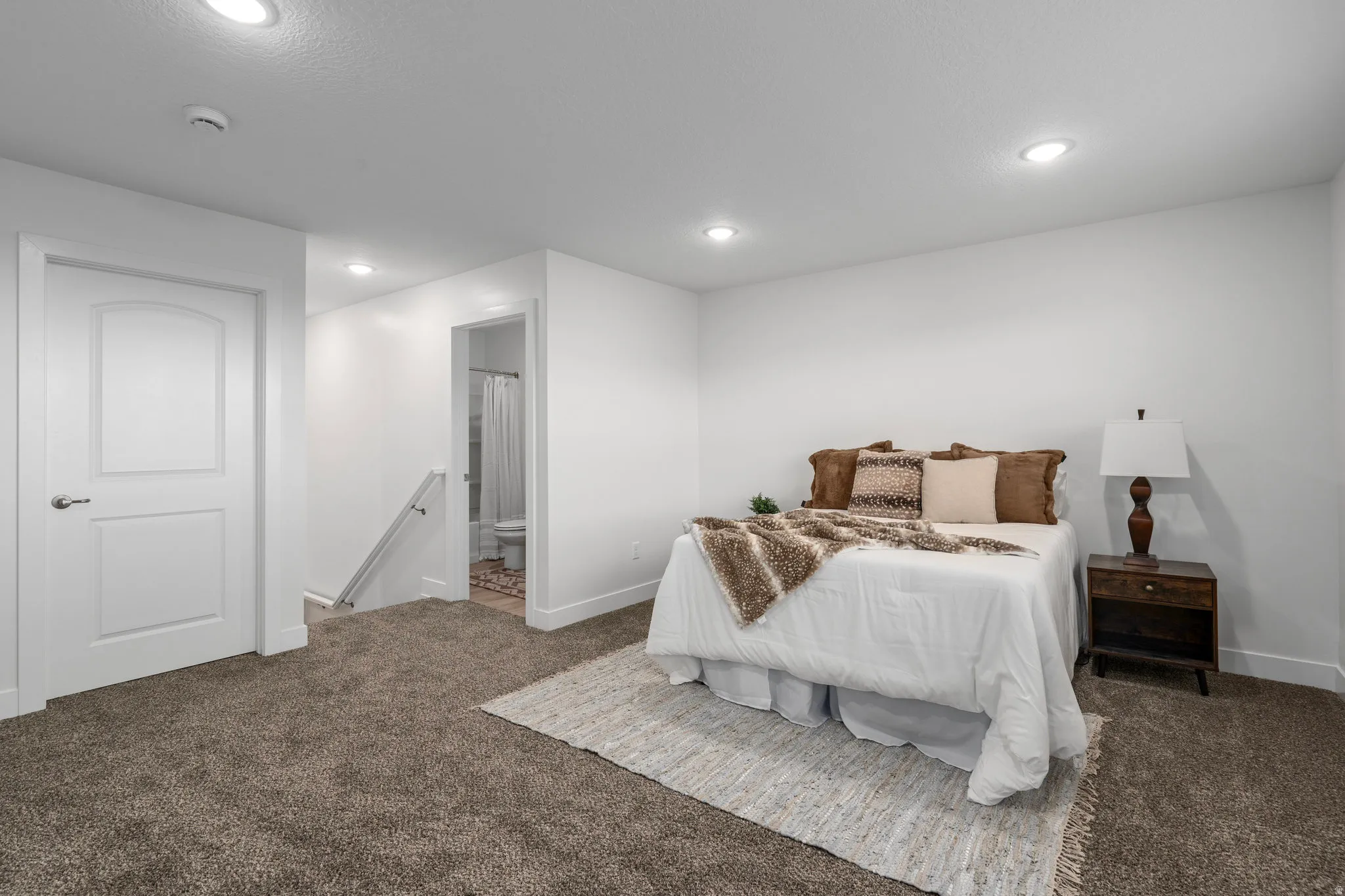 loft space with additional bathroom and walk in closet.