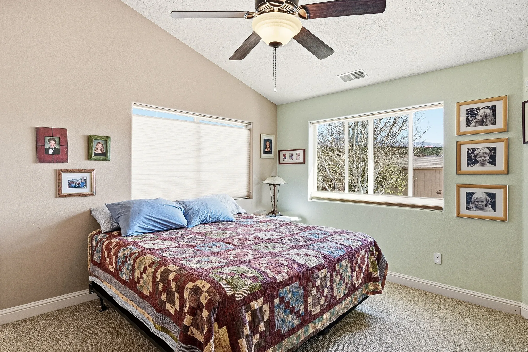 Bedroom with carpet floors and ceiling fan