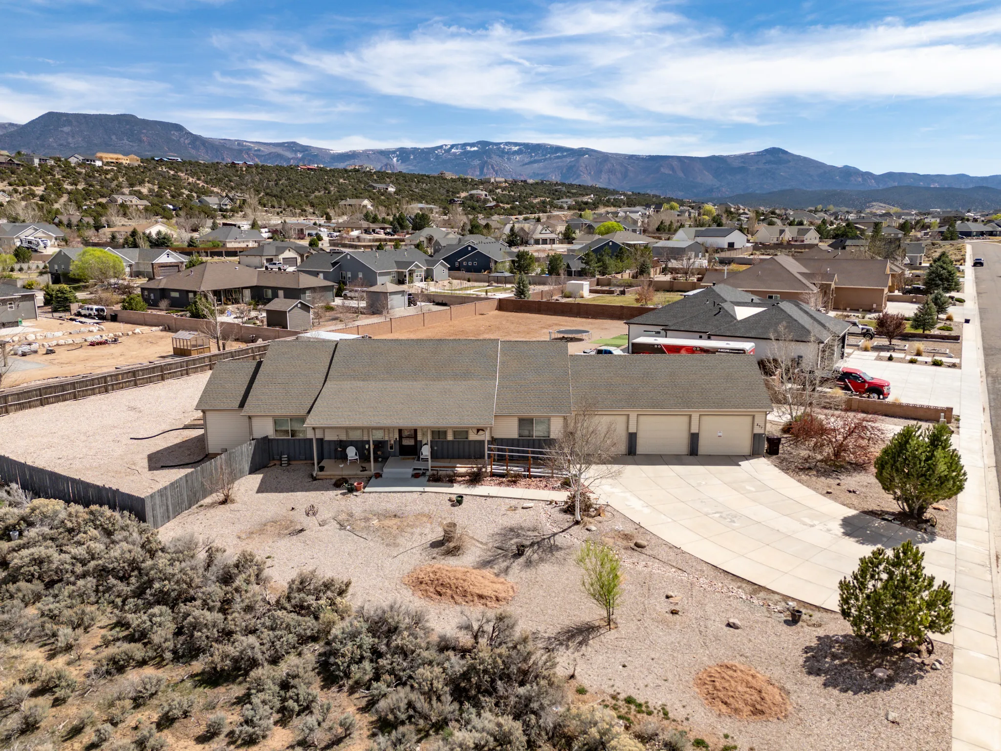 Aerial view of residential area with a mountain backdrop