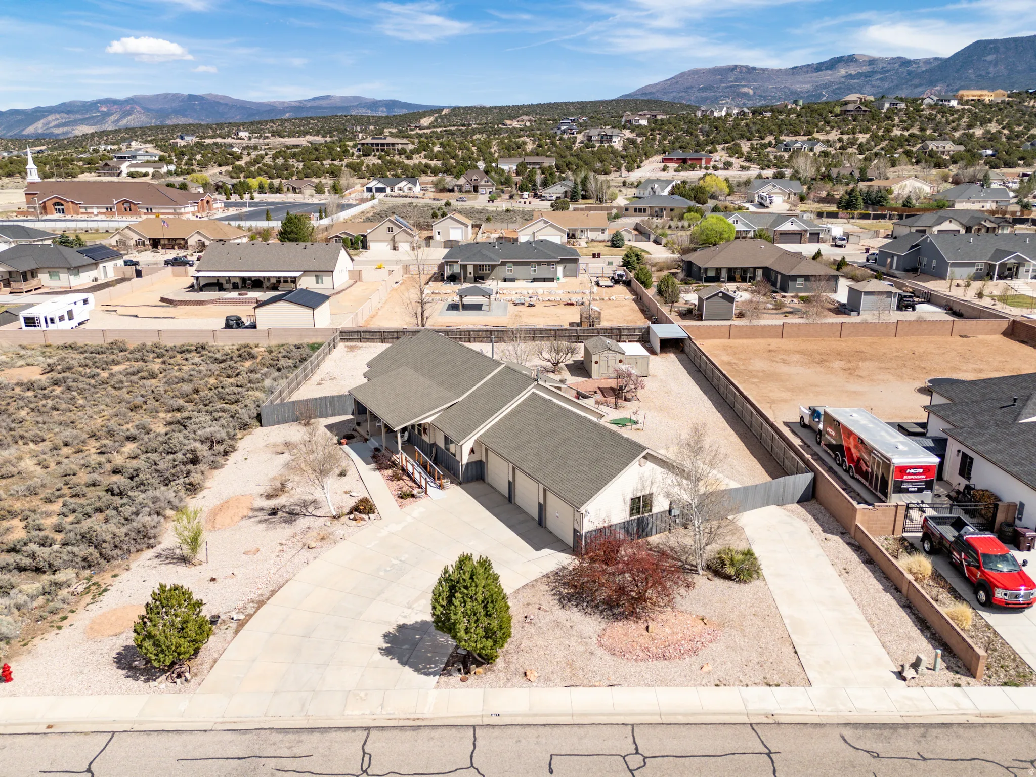 Aerial perspective of suburban area featuring mountains