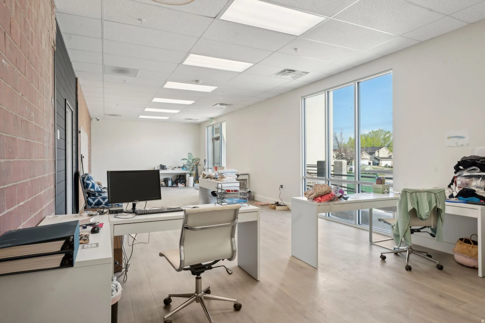 Office featuring a drop ceiling