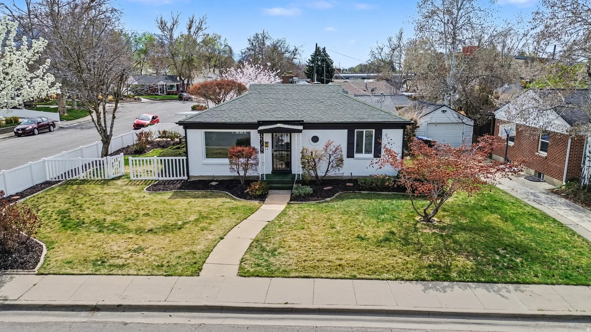 Bungalow with roof with shingles and a residential view