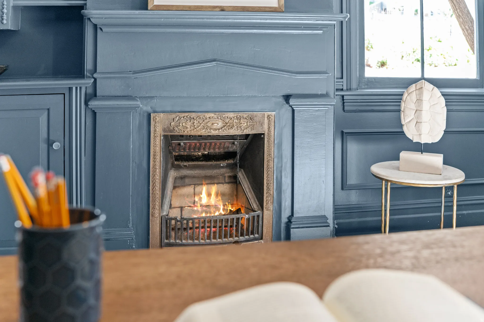 Detailed view of a lit fireplace