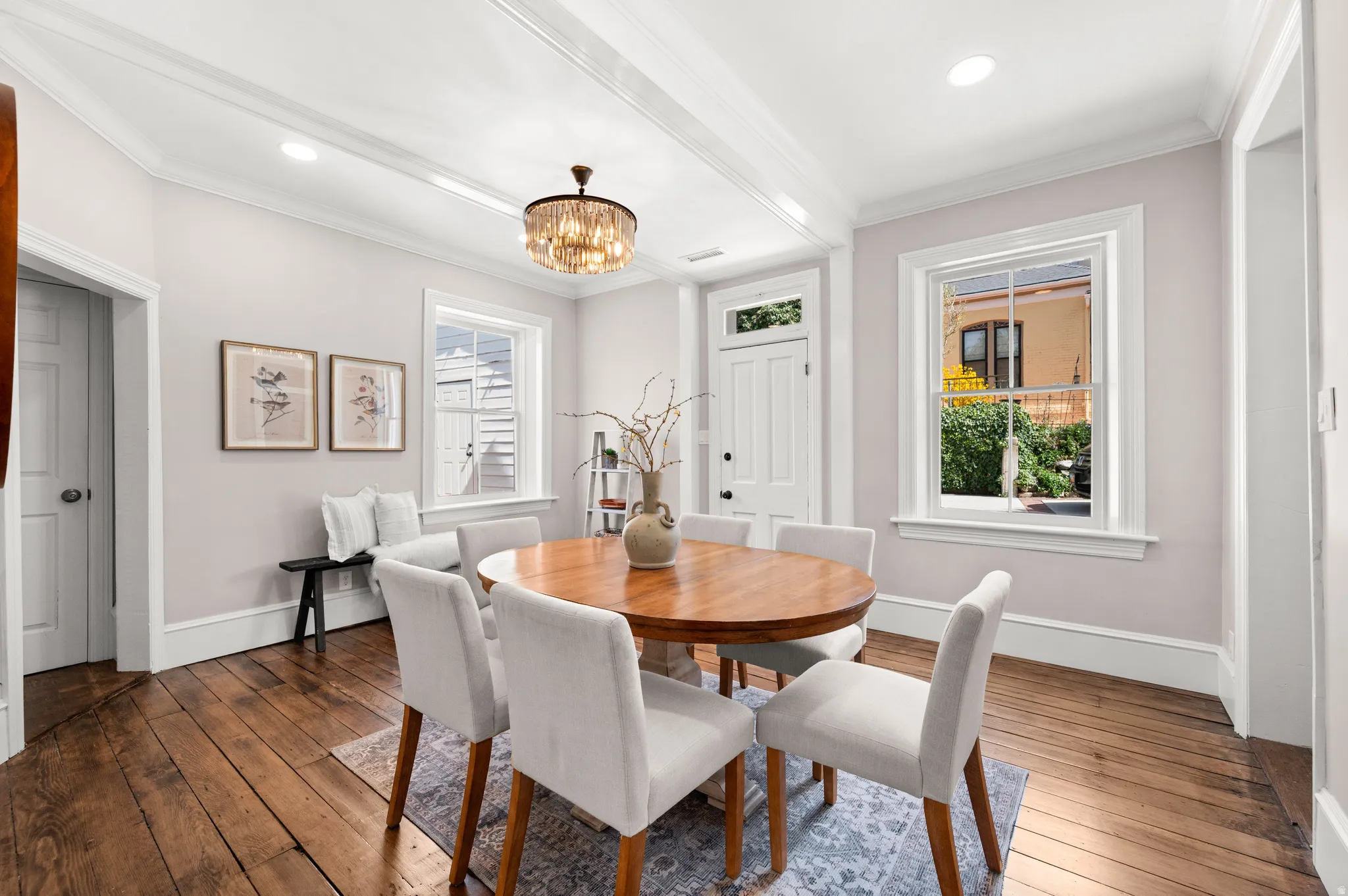 Formal dining with large east and north facing windows