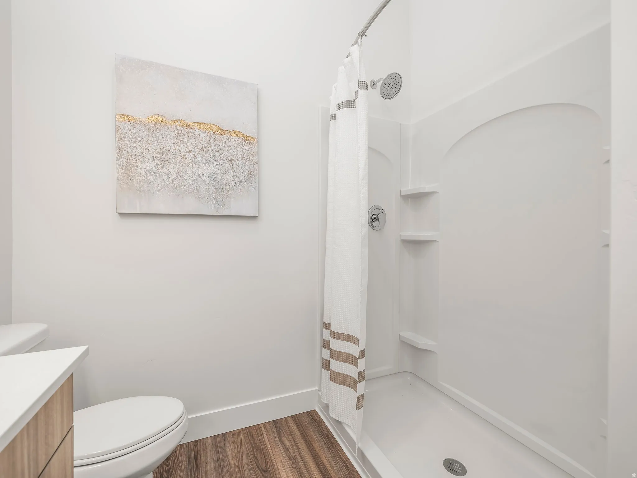 Primary en' suit with double vanity and walk in shower.