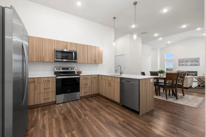 Modern Kitchen with quartz counters and stainless steel appliances. *Fridge not included*