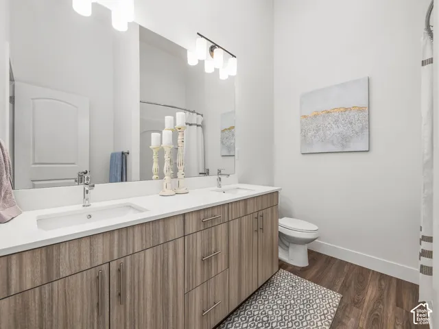 Primary en' suit with double vanity and walk in shower.
