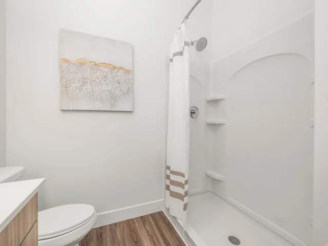 Primary en' suit with double vanity and walk in shower.