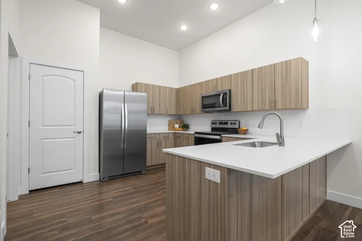 Modern Kitchen with quartz counters and stainless steel appliances. *Fridge not included*