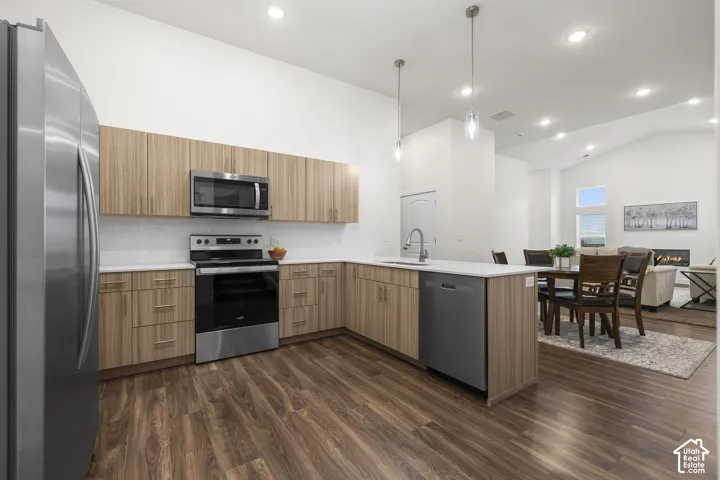 Modern Kitchen with quartz counters and stainless steel appliances. *Fridge not included*