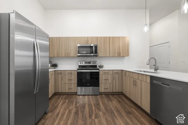 Modern Kitchen with quartz counters and stainless steel appliances. *Fridge not included*