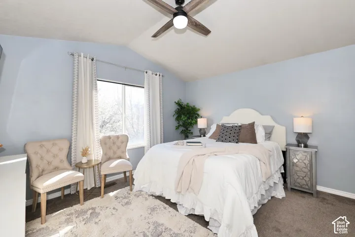 Bedroom featuring carpet floors and ceiling fan