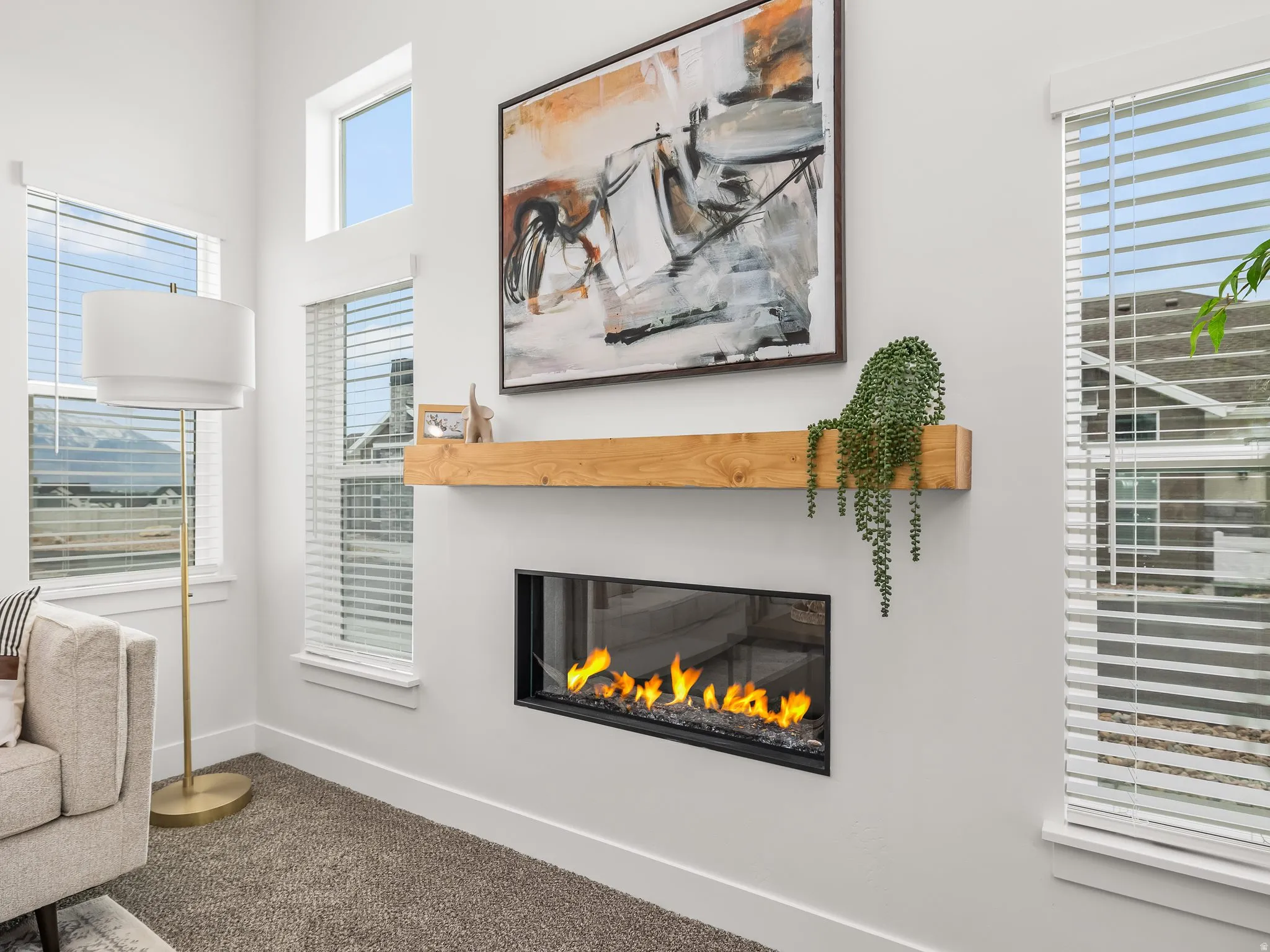 Great room with vaulted ceilings and cozy fireplace.