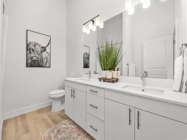 Primary en suite with double vanity and walk in shower