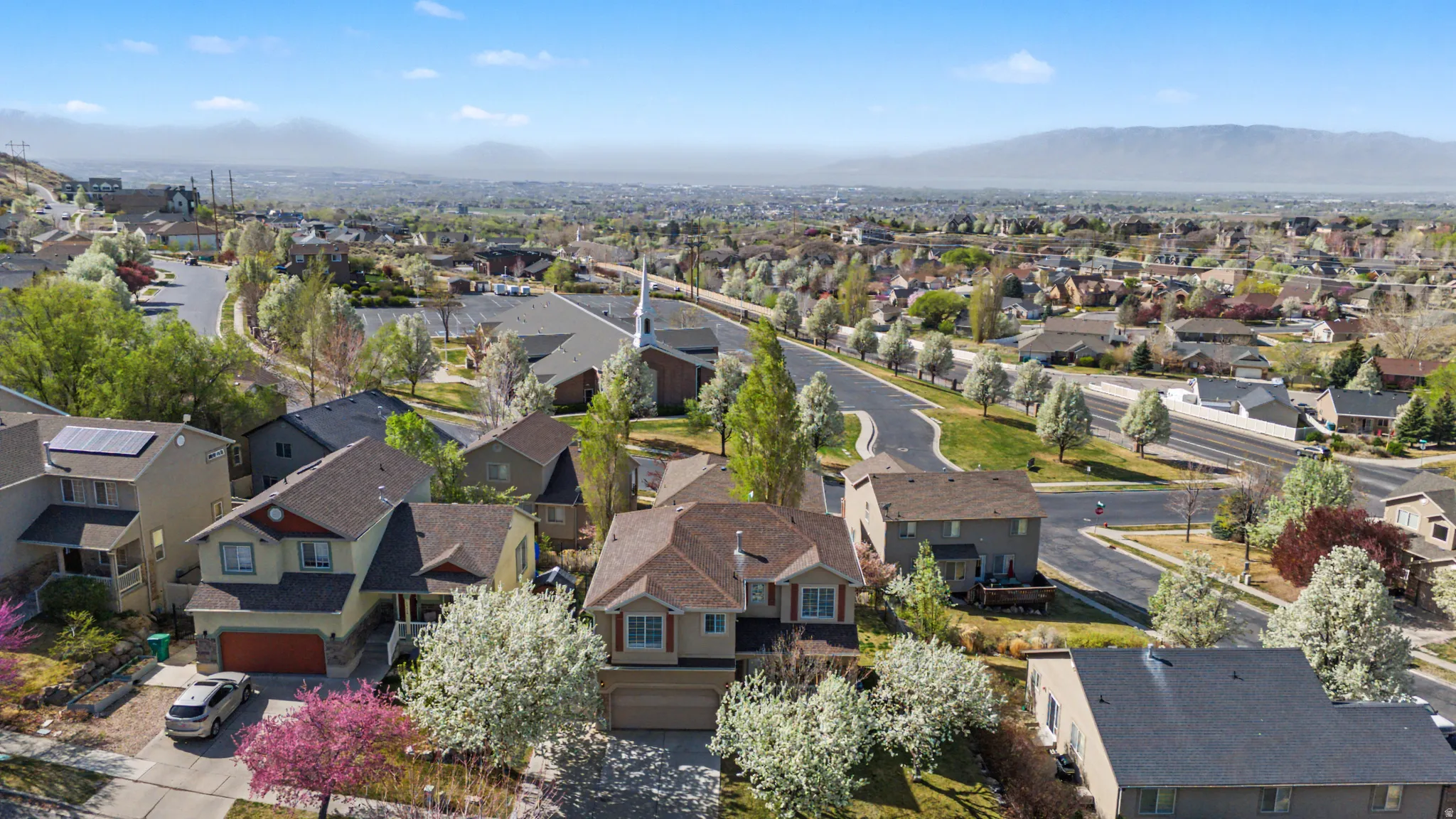 Aerial view of residential area with a mountainous background
