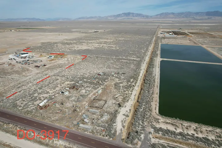 Overview of rural landscape featuring a water and mountain view and a desert landscape