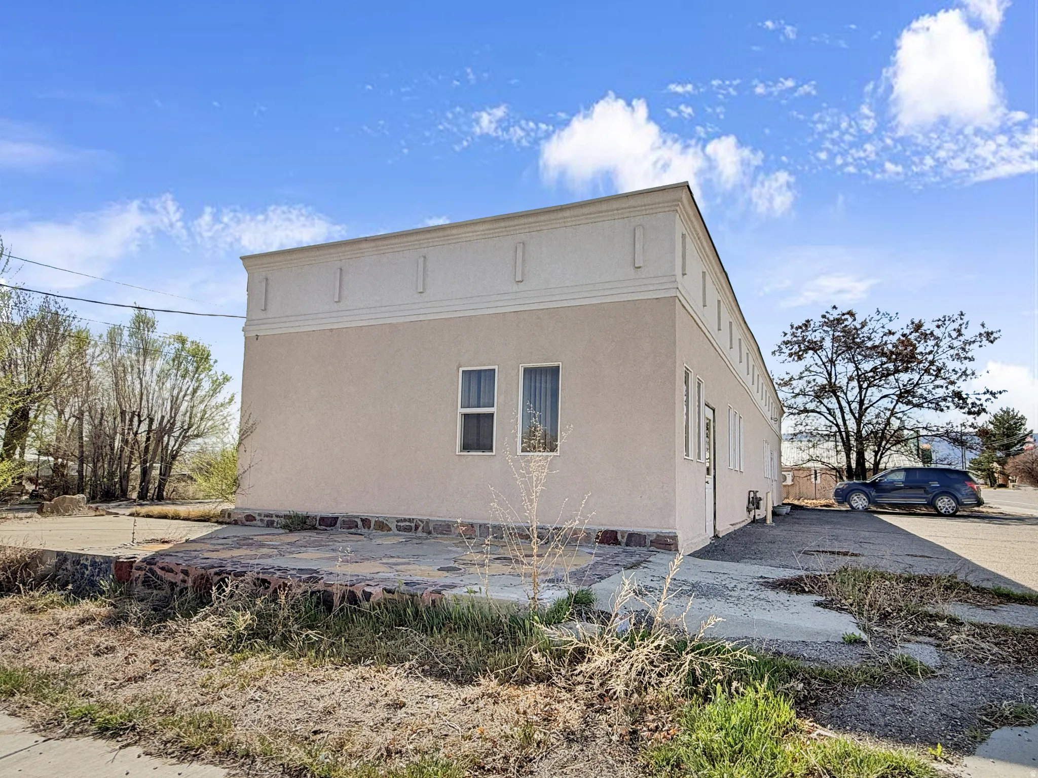 View of home's exterior featuring stucco siding