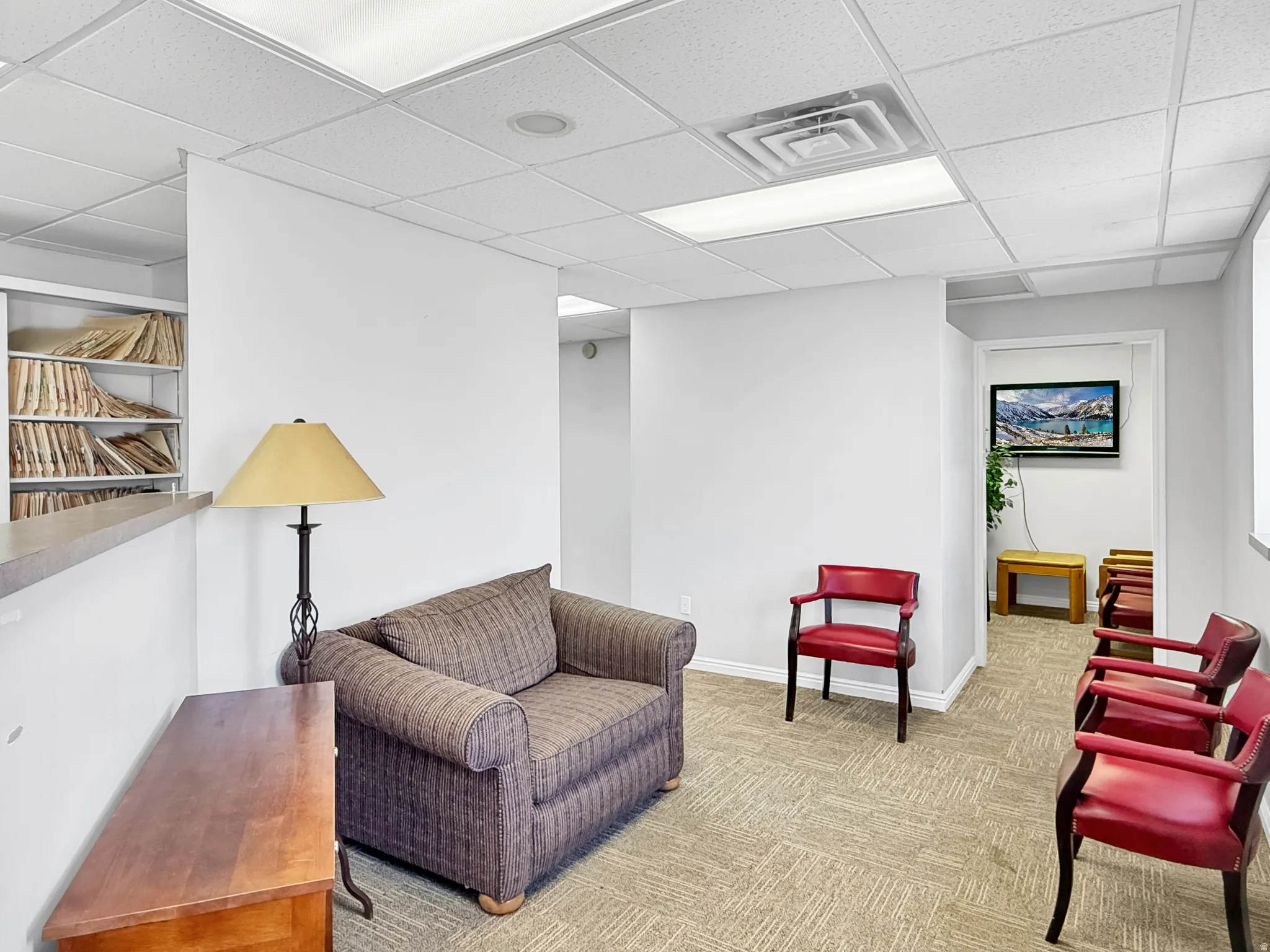 Living area with a paneled ceiling