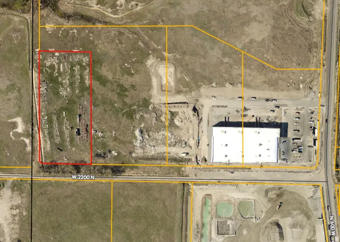 Aerial view of property's location featuring property parcel outlined