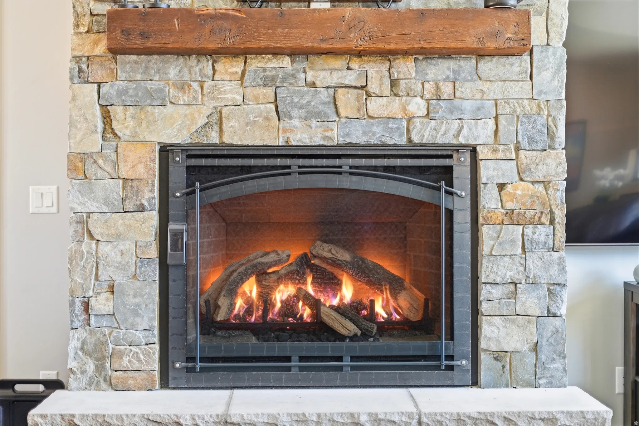 Detailed view of a stone fireplace