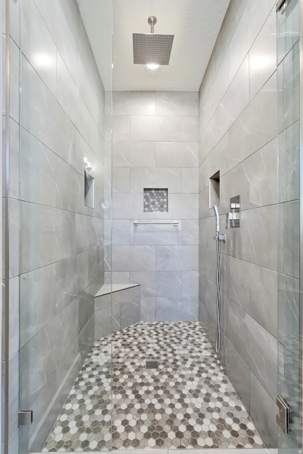 Full bathroom with a stall shower