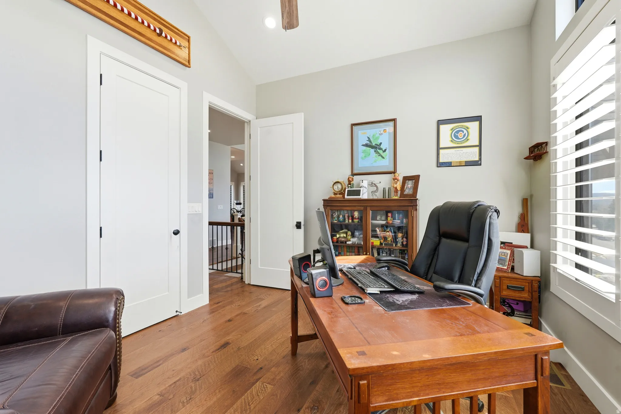 Office area with wood finished floors, ceiling fan, lofted ceiling, and recessed lighting