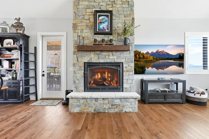 Living room featuring a fireplace and light wood finished floors