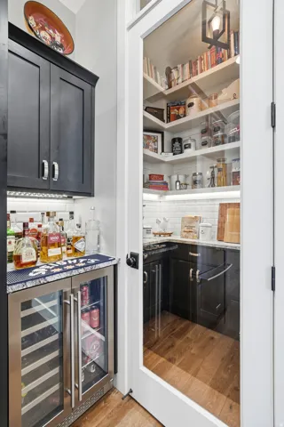 Storage area featuring beverage cooler