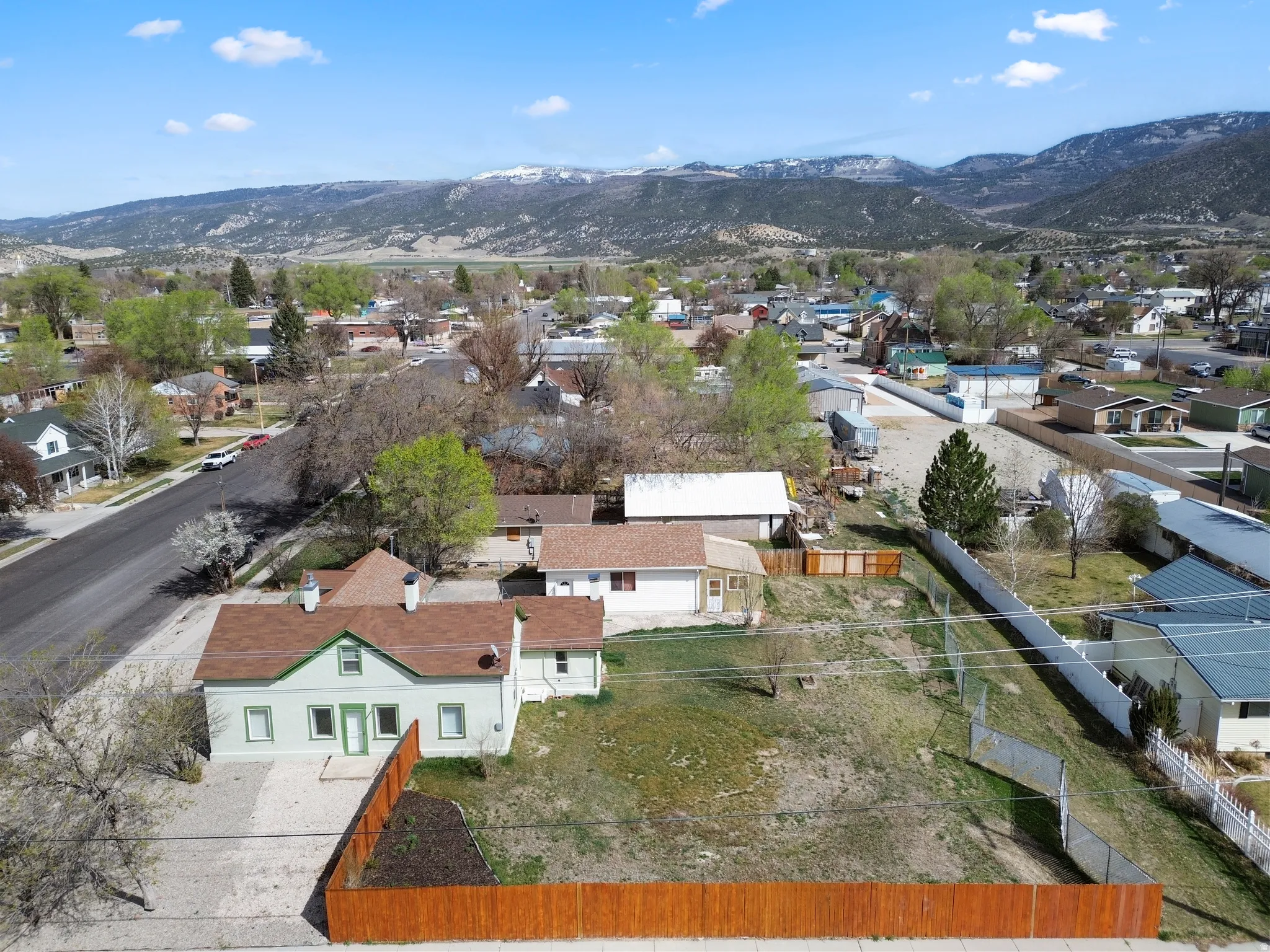 Aerial view of residential area with a mountain backdrop