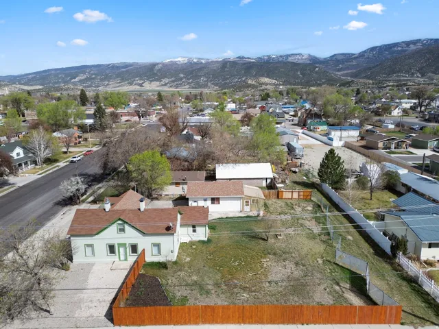 Aerial view of residential area with a mountain backdrop