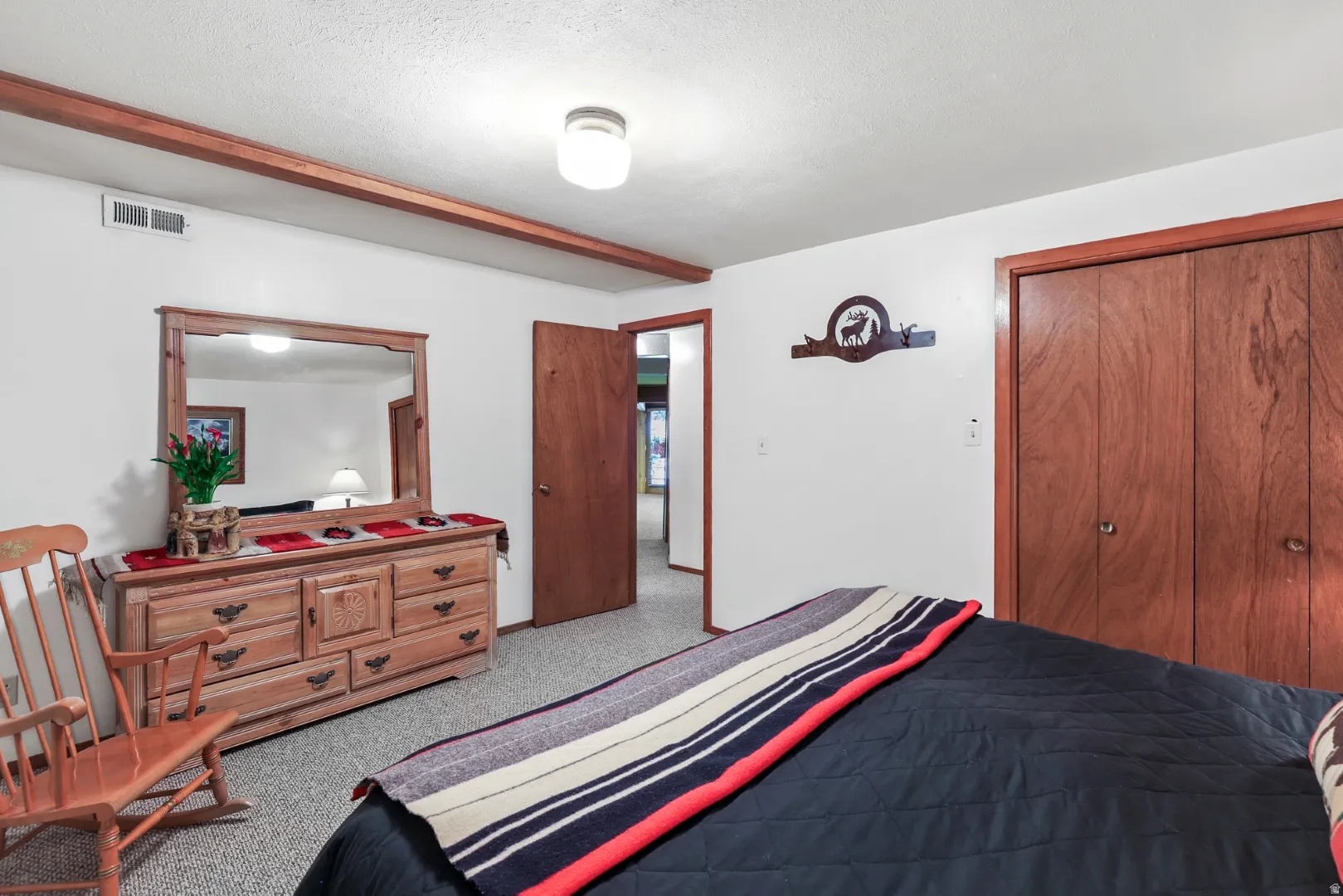 Carpeted bedroom