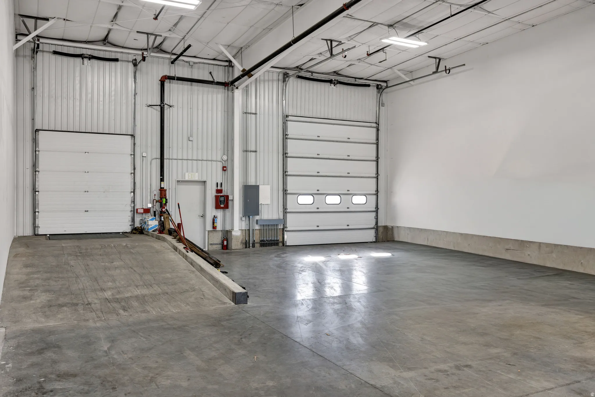 Garage featuring electric panel