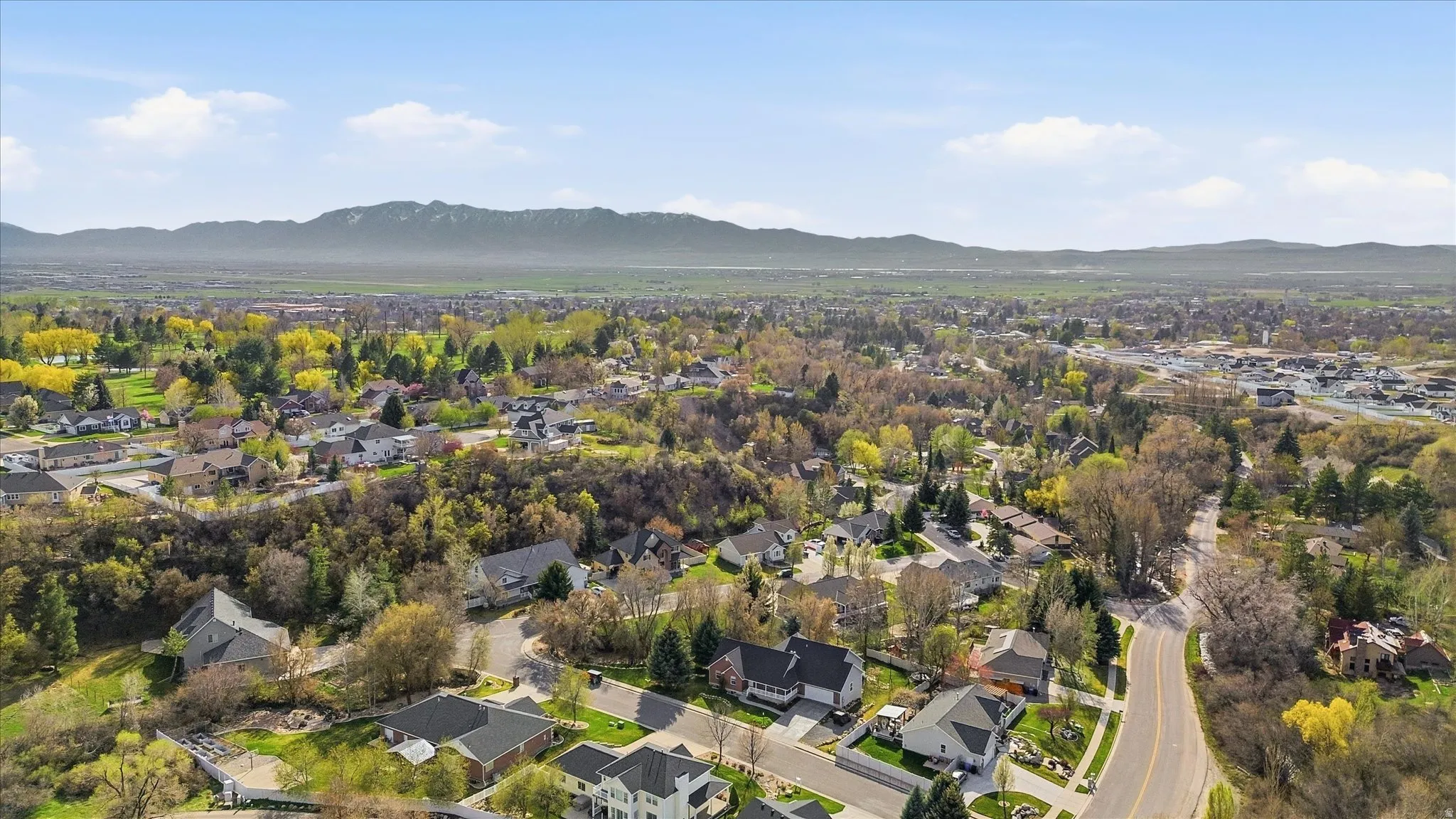 Aerial view of residential area with mountains