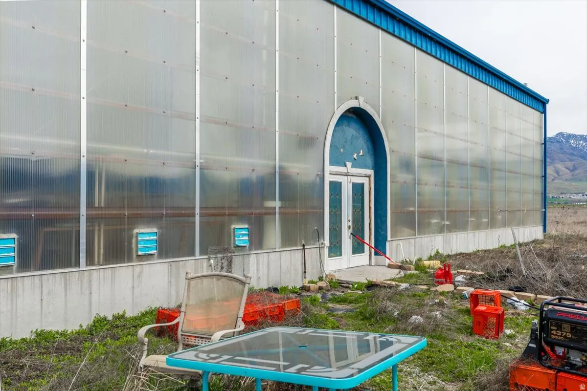 View of outdoor structure featuring french doors