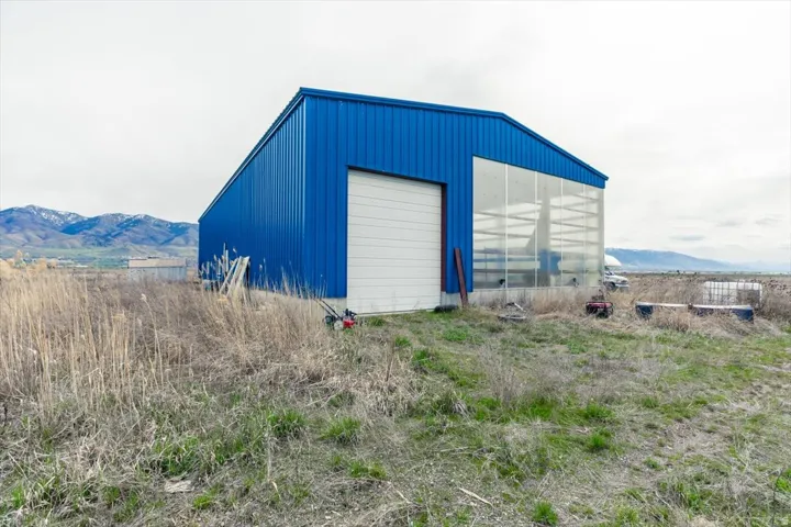 View of outdoor structure featuring a mountain view