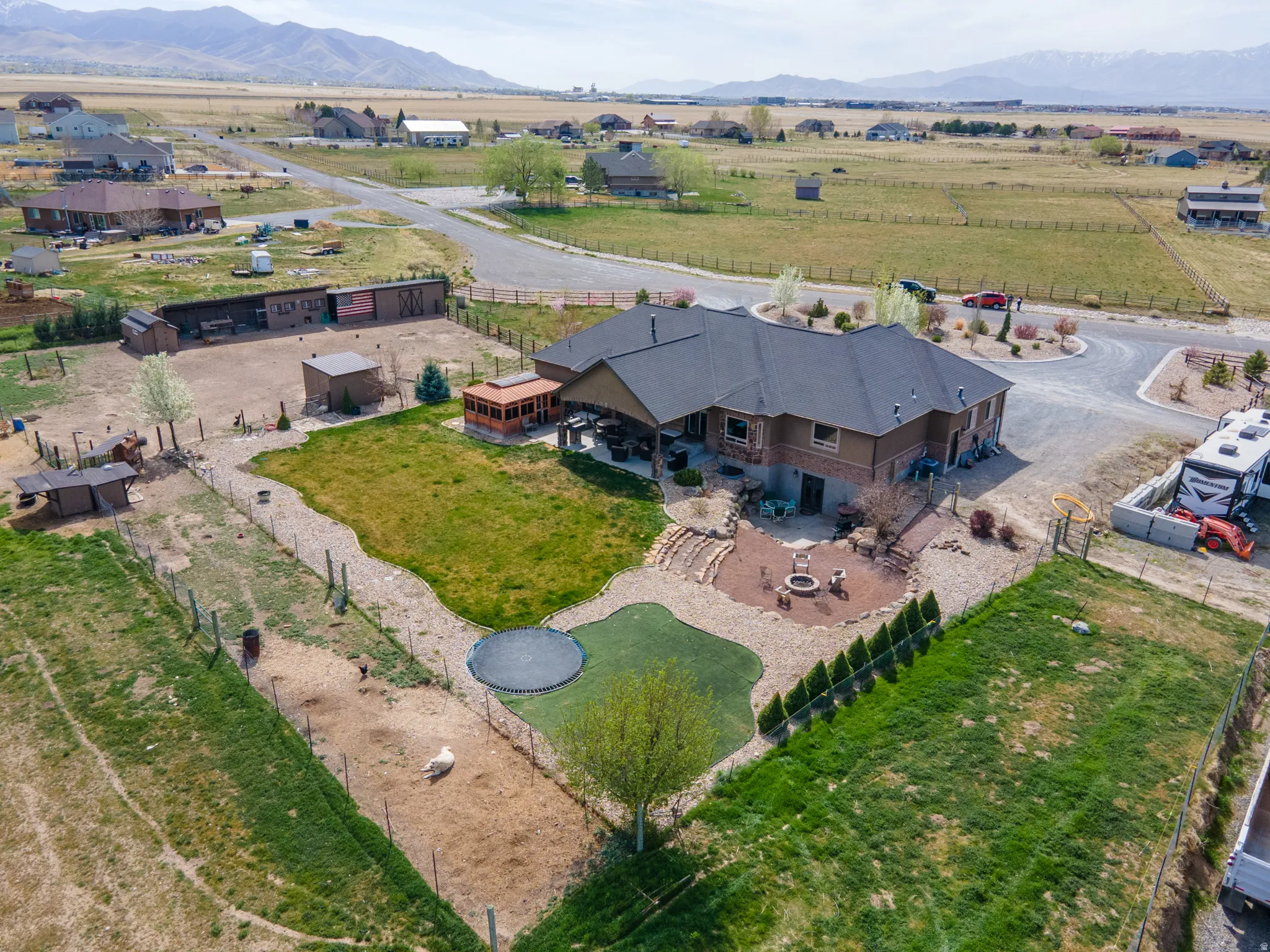 Aerial view of sparsely populated area with a mountain backdrop