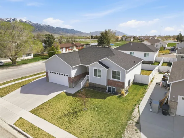 Aerial view of residential area with a mountain backdrop